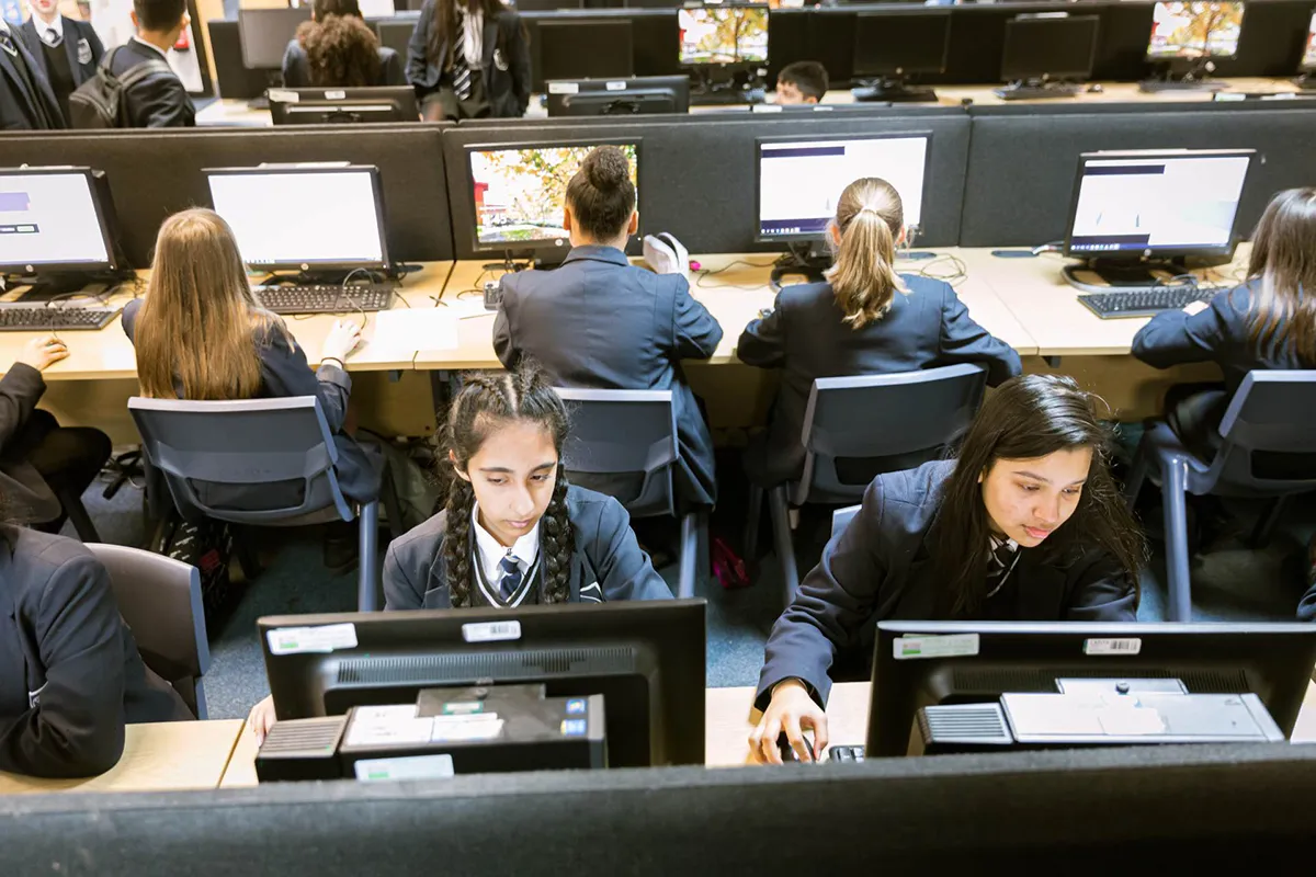 Students studying in a computer suite
