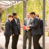 Mr M. McElwee, Academy Headteacher, talking to students outside