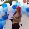 Student celebrates her results on GCSE Results Day 2022