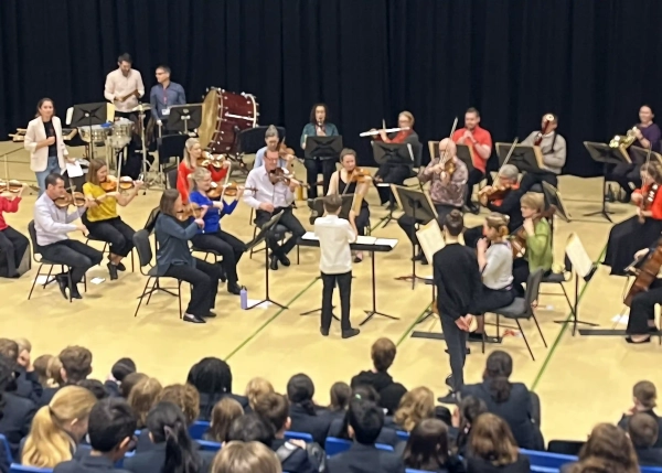 Student conducting the musicians